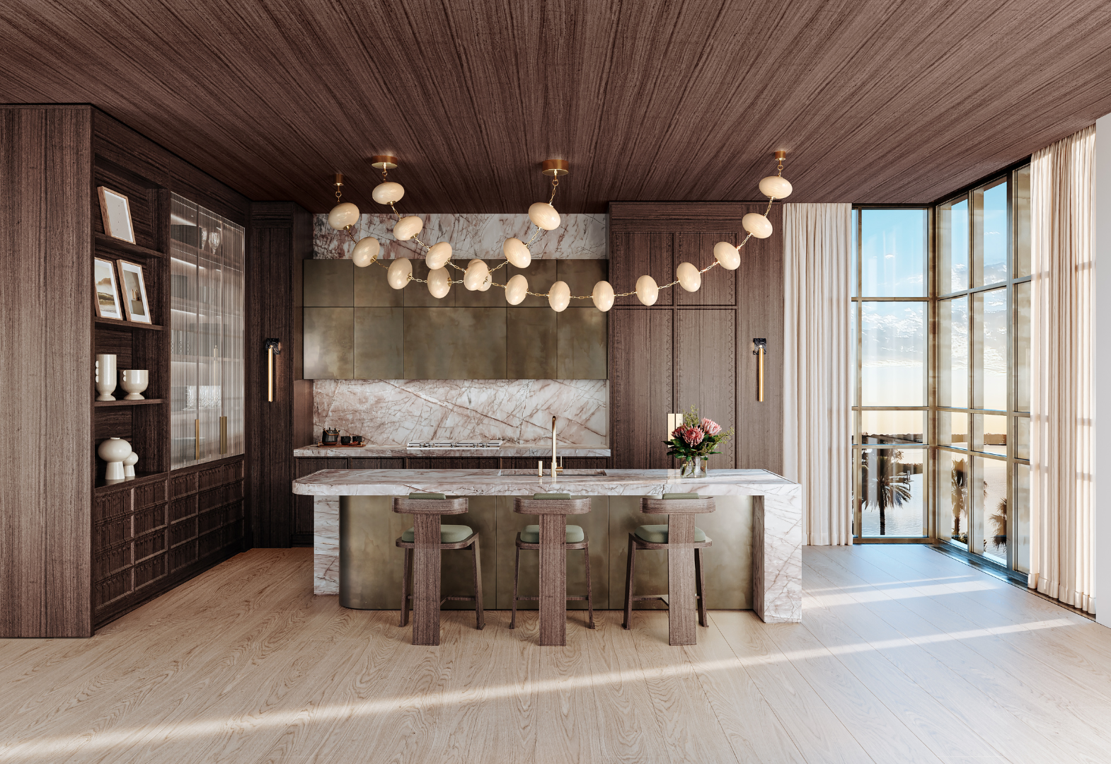 Kitchen island shot with Nephele chandelier and Silja wall sconces by Corbett Lighting