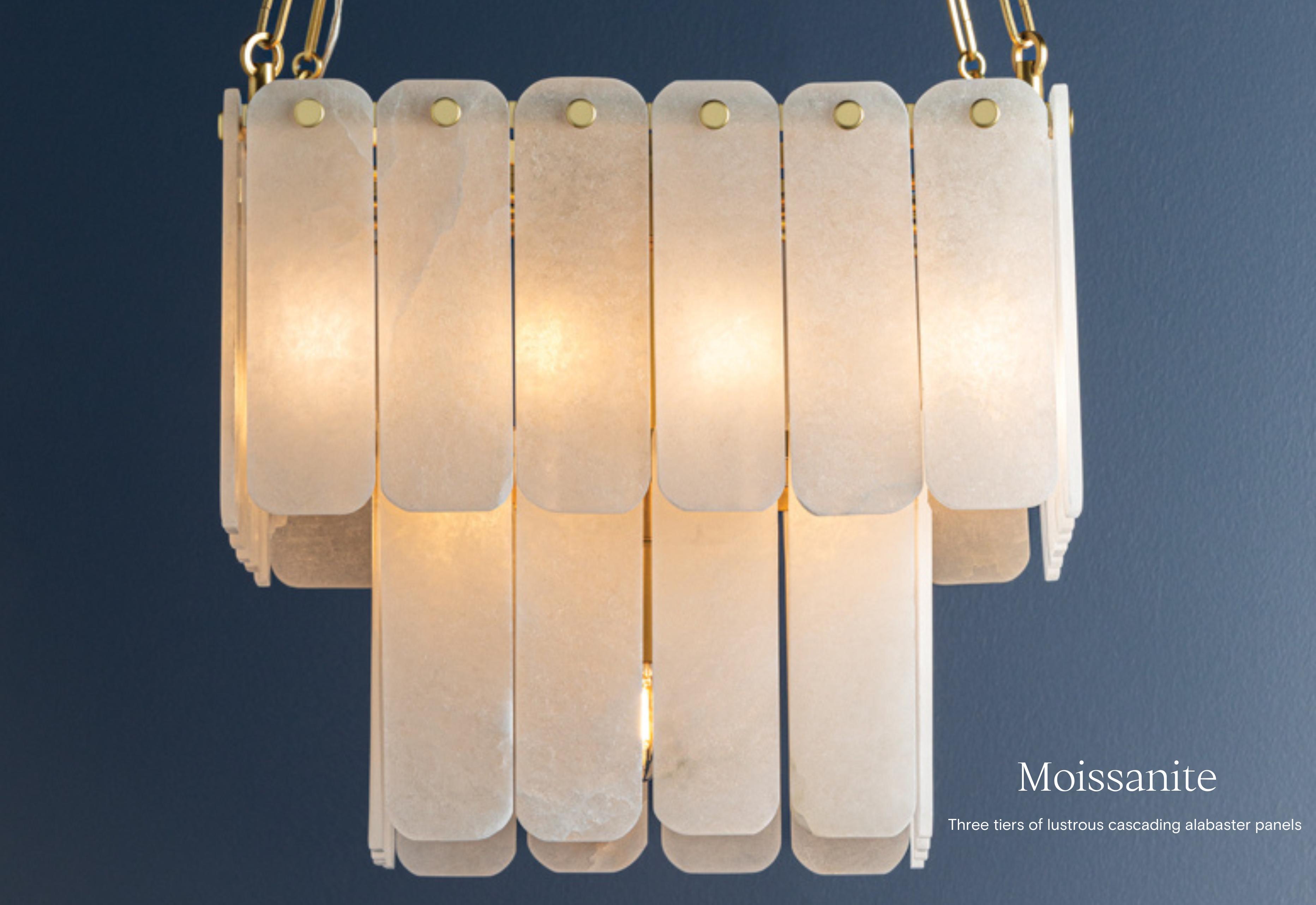 The Moissanite chandelier by Hudson Valley Lighting with tiers of lustrous cascading alabaster panels