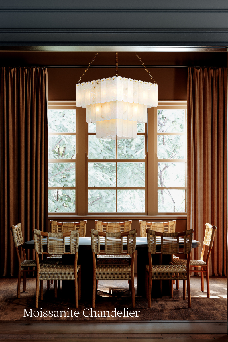 Elegant dining room with large Moissanite chandelier by Hudson Valley Lighting